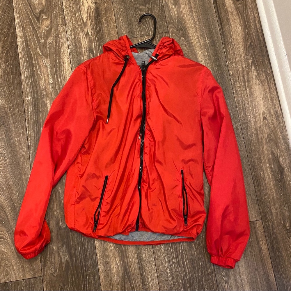 red windbreaker